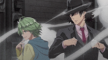 a man in a suit and tie is standing next to a boy with green hair