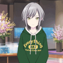 a girl is wearing a green hoodie that says everything 1987 started from here