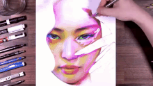 a person is drawing a woman 's face with a pencil that says schneider on it