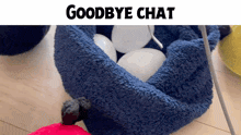 a blue blanket filled with white balls and the words goodbye chat on top