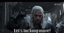 a man with long white hair says let 's fucking move .