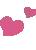 a couple of pink hearts on a white background .