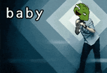a cartoon of a man with a green head and the word baby on the bottom