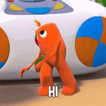 a cartoon character is standing in front of a toy car with the word hi written on it .
