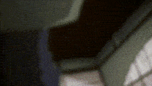 a close up of a person 's face with a blurred background of dots .