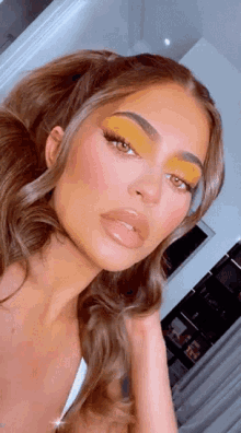 Kylie Makeup GIF - Kylie Makeup Yellow GIFs
