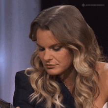 Chewing Michele Romanow GIF - Chewing Michele Romanow Dragons' Den GIFs