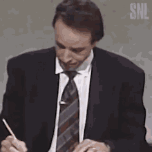 Taking Notes Kevin Nealon GIF - Taking Notes Kevin Nealon Saturday Night Live GIFs