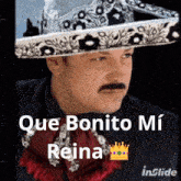 a man wearing a mariachi hat with the words que bonito mi reina below him
