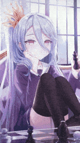 a girl with a crown on her head is sitting on a chair holding a chess piece