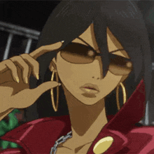 a close up of a cartoon character wearing sunglasses and earrings .
