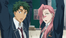 a boy with green hair and a girl with pink hair are standing next to each other in front of a blackboard