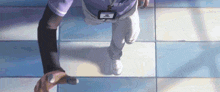 a person wearing a lanyard with a name tag that says ' nurse ' on it