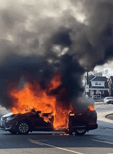 a car is on fire in a parking lot