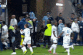 a soccer game is being played and the score is 1 to 3