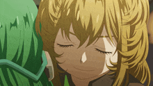 a close up of a girl 's face with closed eyes