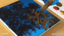 a painting of trees is being painted on a canvas by joony art
