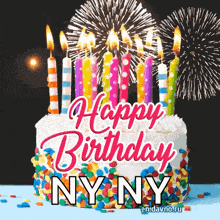 a happy birthday greeting card with a cake and fireworks