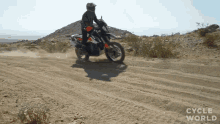 Driving Through Sand With Motorcycle Cycle World GIF - Driving Through Sand With Motorcycle Cycle World Leaving A Dust Cloud GIFs