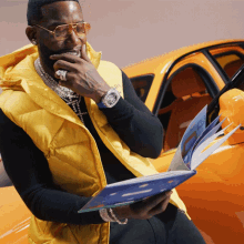 Reading A Book Gucci Mane GIF - Reading A Book Gucci Mane Fake Friends Song GIFs