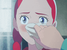 a cartoon girl with red hair is covering her mouth with a cloth