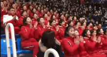 winter olympics clap north korea fake cheerleader