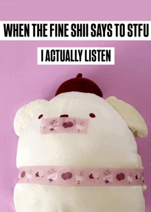 a stuffed animal with a sticker on it that says ' when the fine shii says to stfu '