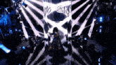 a wrestler is walking through a tunnel with a sign that says no sky