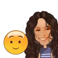 a woman with curly hair is smiling next to an emoji