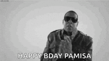a black and white photo of a man wearing sunglasses and a jacket saying happy bday pamisa .