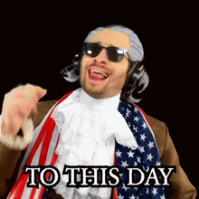 a man wearing a wig and sunglasses is pointing at the camera with the words to this day below him