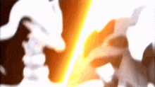 a blurred image of a person 's face with a flame coming out of it