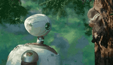 a robot is standing next to a tree with a squirrel in it