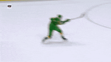 a hockey game is being played and the goalie is number 2