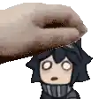 a hand is holding a cartoon character 's head with a scarf around his neck .