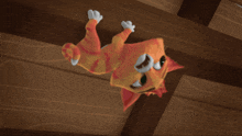 a cartoon cat hanging upside down on a wooden beam