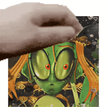 a picture of a green alien with red eyes is being touched