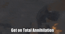 a robot with the words " get on total annihilation " on it