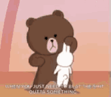 a brown teddy bear is holding a white rabbit while standing next to it .