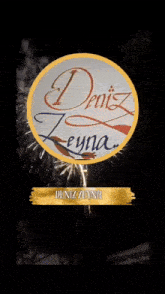 a sign that says deniz leyna on it with fireworks in the background