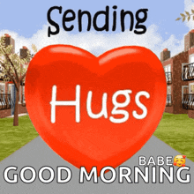 a red heart with the words sending hugs and good morning written on it