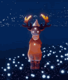 a person in a reindeer costume is standing in a field with a candle in their hand .