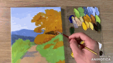 a person is painting a landscape with the words made in animotica visible
