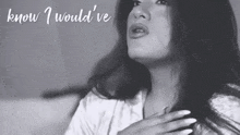 a black and white photo of a woman with the words " know i would 've " below her