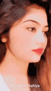 a close up of a woman 's face with the words bas coins chahiye above her