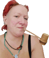 a woman with red hair smoking a pipe with a nose ring
