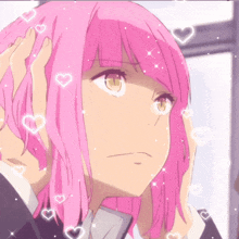 a girl with pink hair has hearts floating around her head