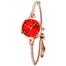 a skmei watch with a red face and diamonds on the band