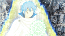 a man with blue hair is holding a green circle that says ' a ' on it