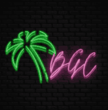 a neon sign with a palm tree and the word bac on a black brick wall .